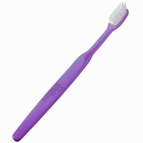 Elgydium Clinic 25/100 Semi-Hard Toothbrush Χειροκίνητη Οδοντόβουρτσα Μέτρια προς Σκληρή 1 Τεμάχιο - Μωβ